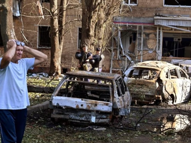 a man reacts while standing next to burnt out remains of cars in the courtyard of a multi storey residential building which according to local authorities was hit by debris from a destroyed ukrainian missile in the course of russia ukraine conflict in kursk russia photo reuters a man reacts while standing next to burnt out remains of cars in the courtyard of a multi storey residential building which according to local authorities was hit by debris from a destroyed ukrainian missile in the course of russia ukraine conflict in kursk russia photo reuters
